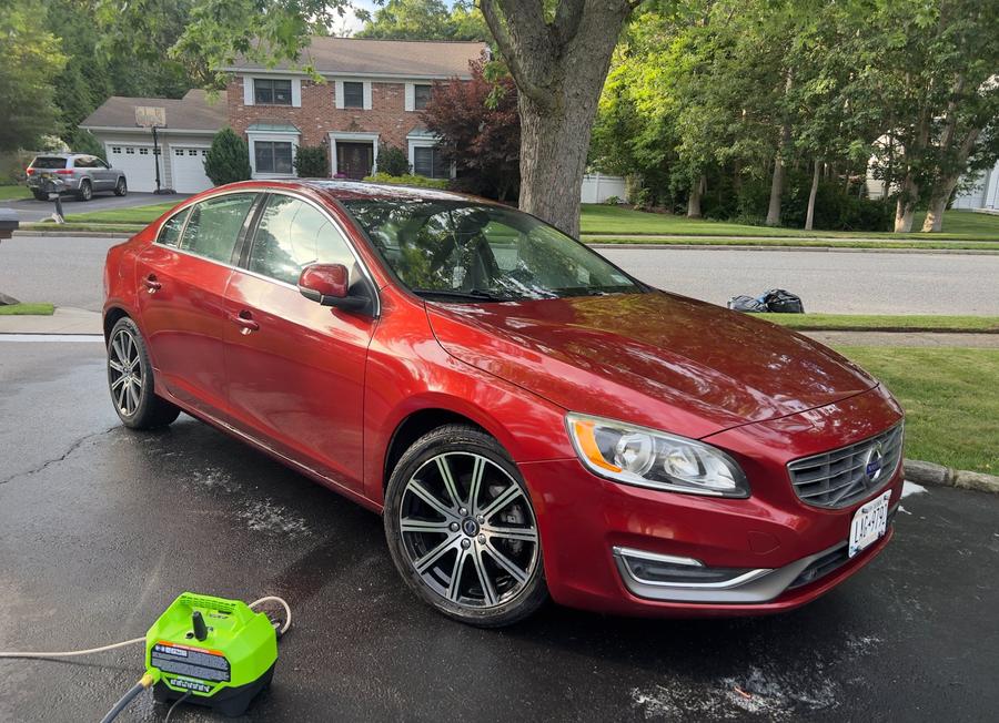 Red Volvo exterior detail after Long Island NY